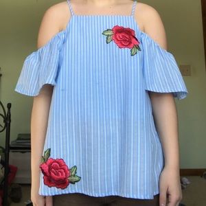 blue blouse with roses